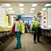 Ann Arbor resident Emma Li, 8, walks through as row of Southeastern Michigan Science Fair projects in the Morris Lawrence building at Washtenaw Community College on Saturday, March 9. Daniel Brenner I AnnArbor.com